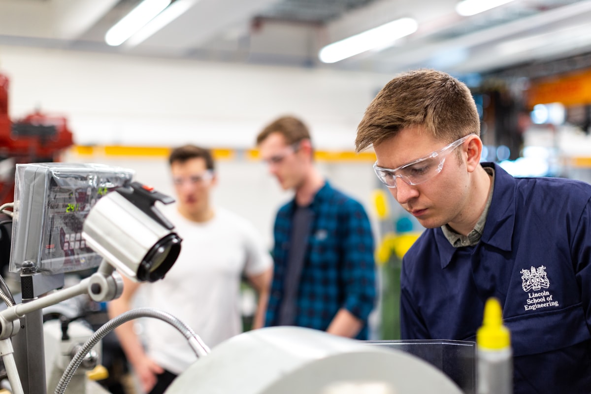 Lab technician performing microscope inspection